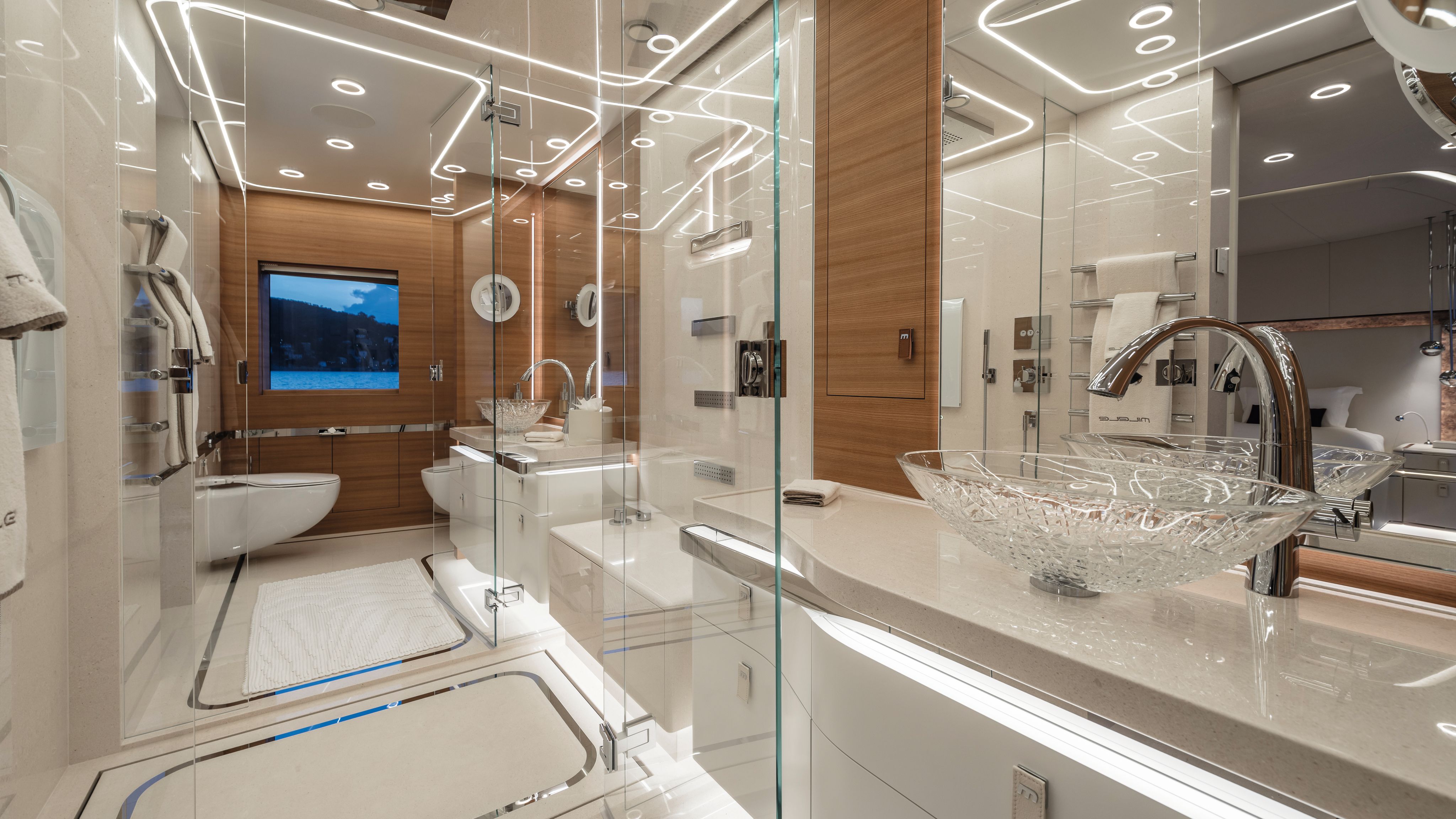 View of bathroom with glass sink