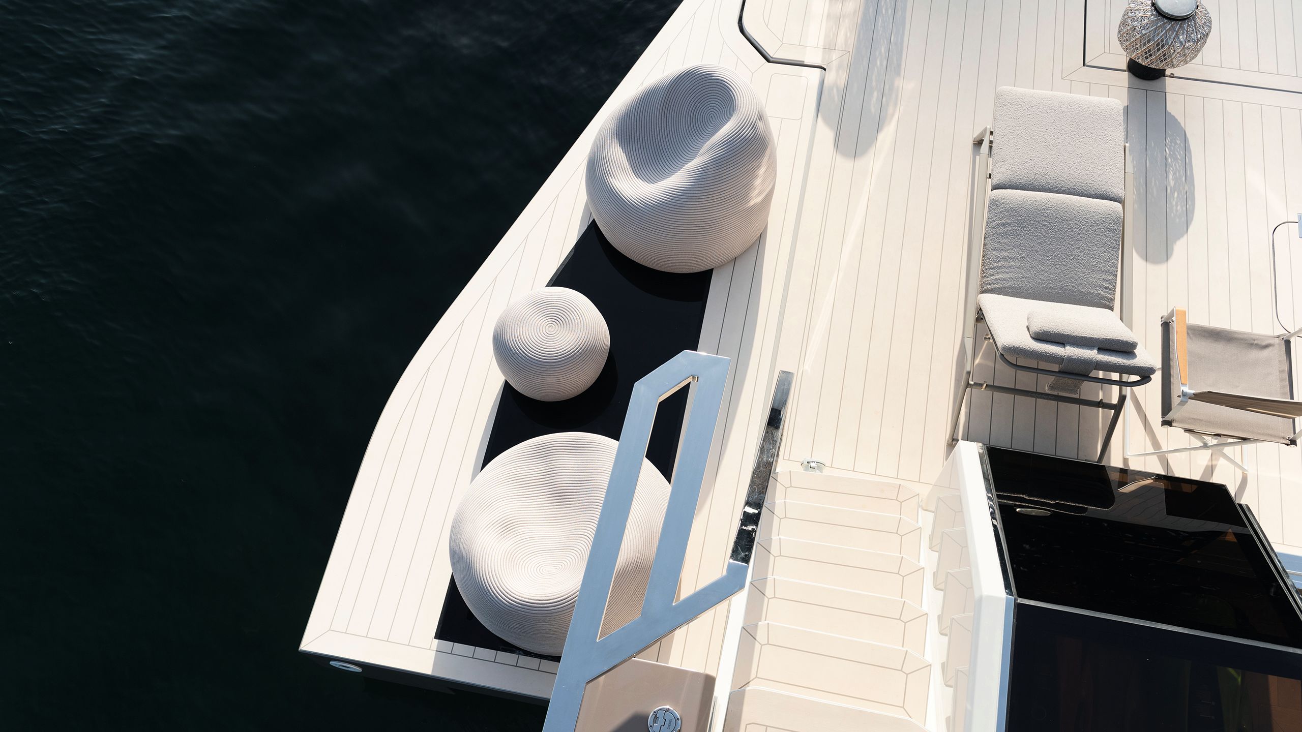Chairs and loose furniture on sunny deck