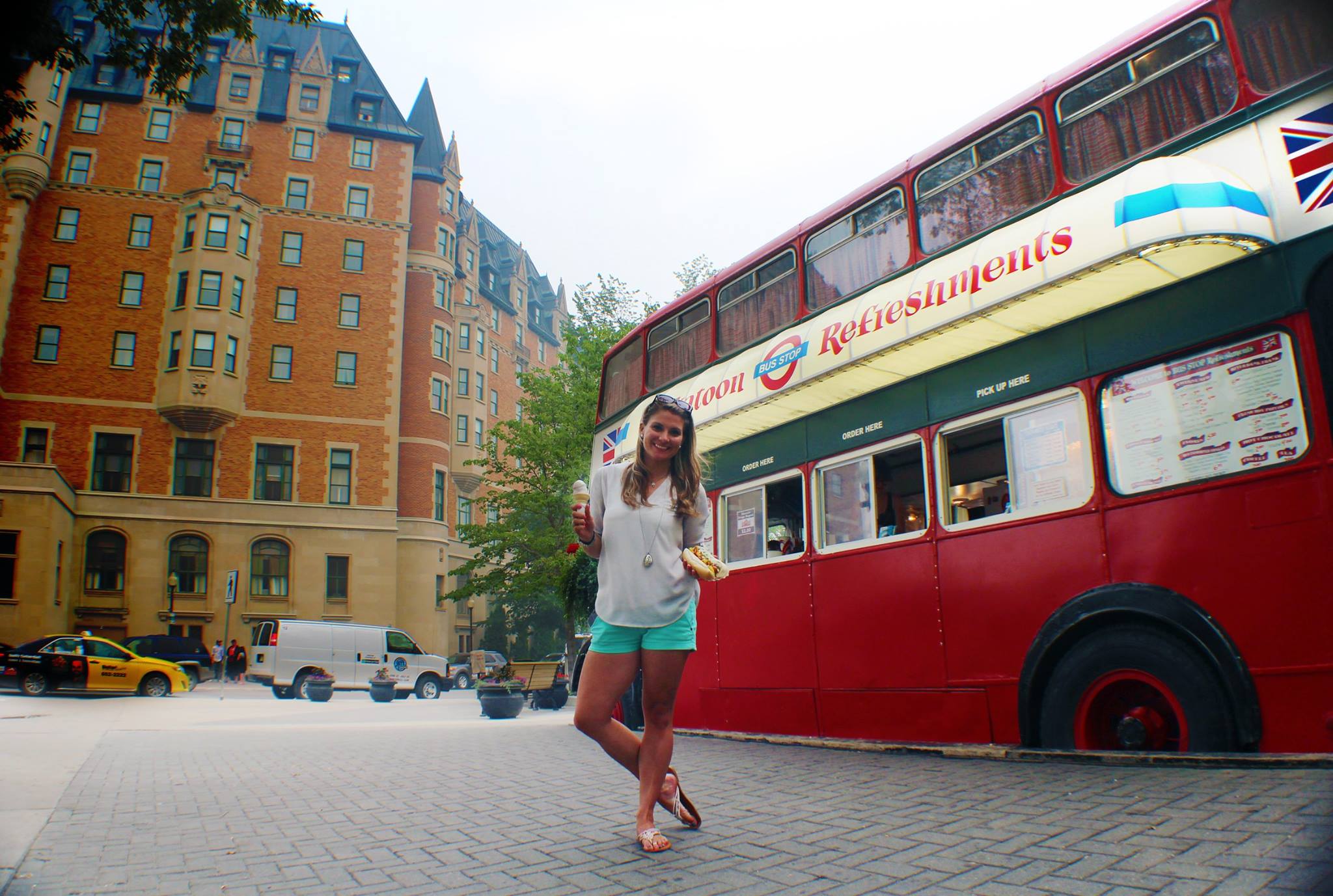 a hot dog stand and an ice cream parlour housed in an antique double-decker bus