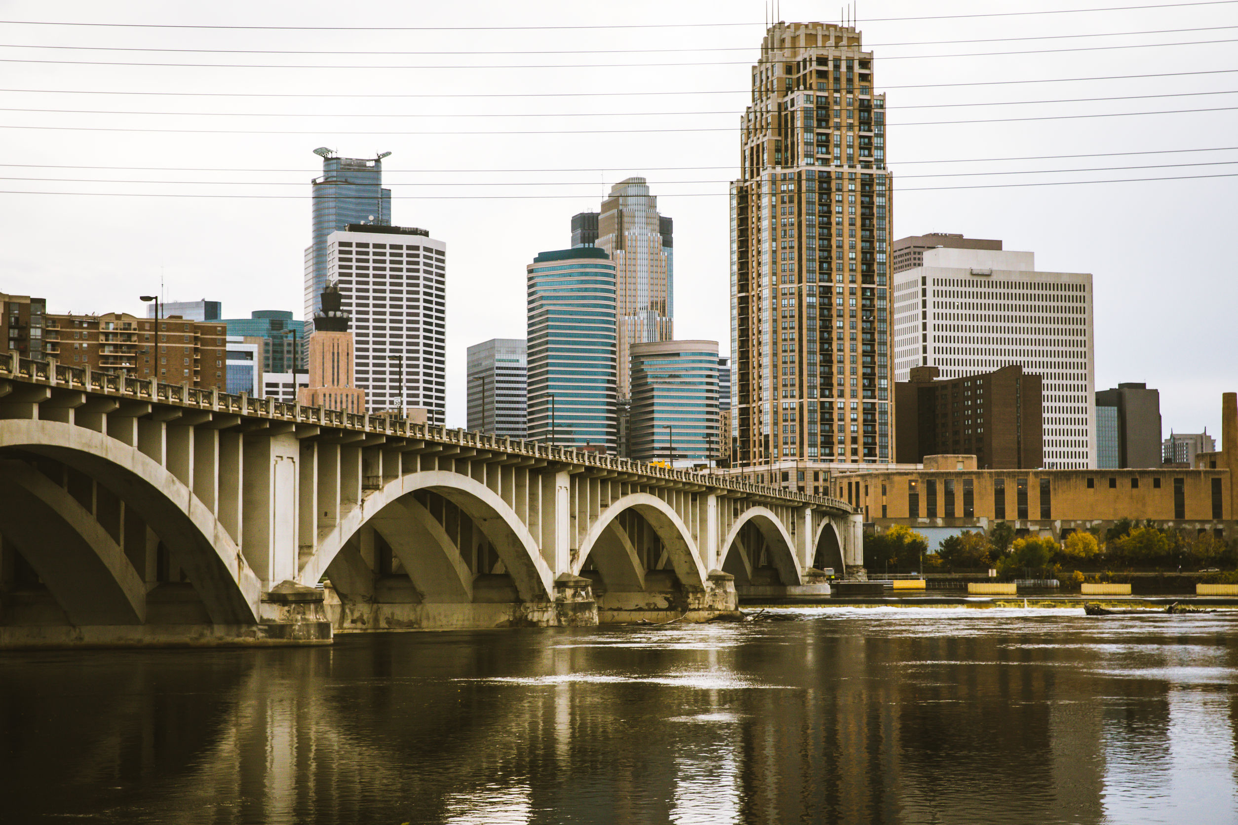 a bridge and city view of Minneapolis