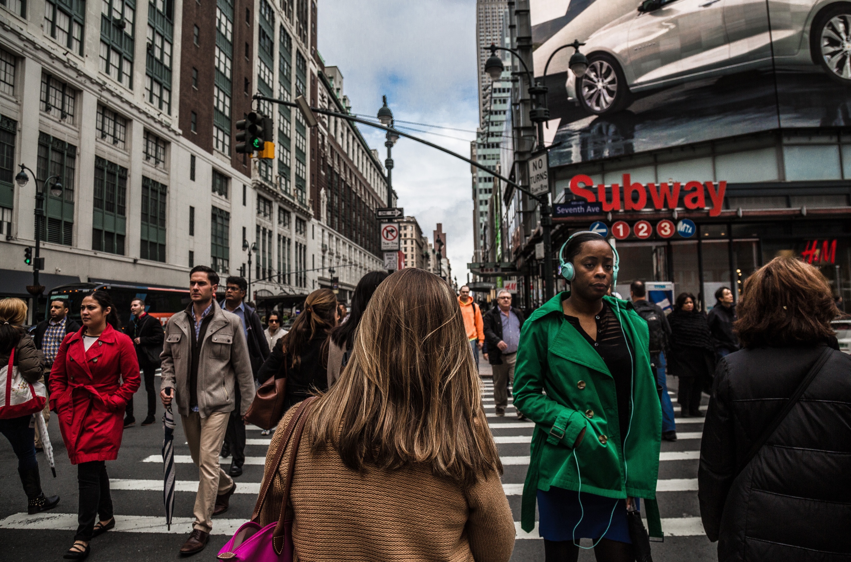 A very busy street intersection in NYC