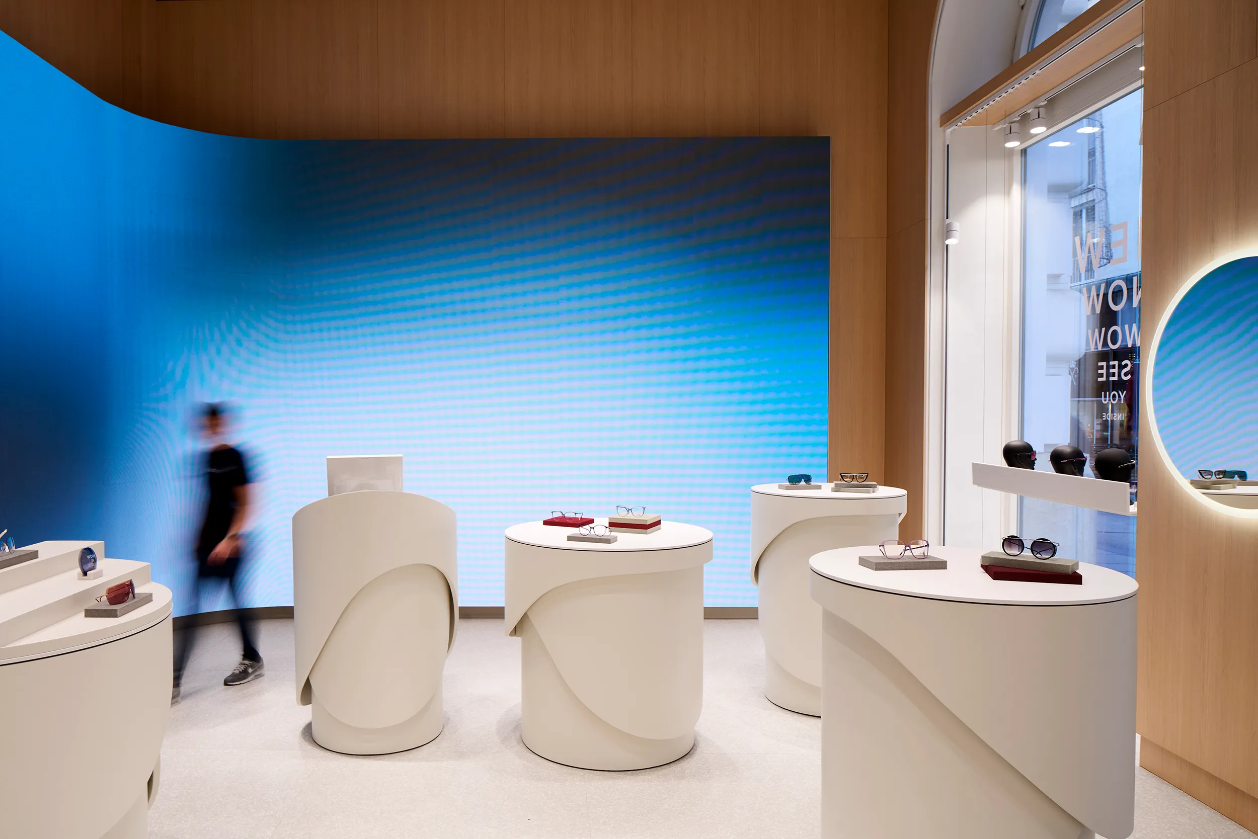 Ground floor interaction space at House of Silhouette designed by Ippolito Fleitz Group with HearDis! in-store music curation.