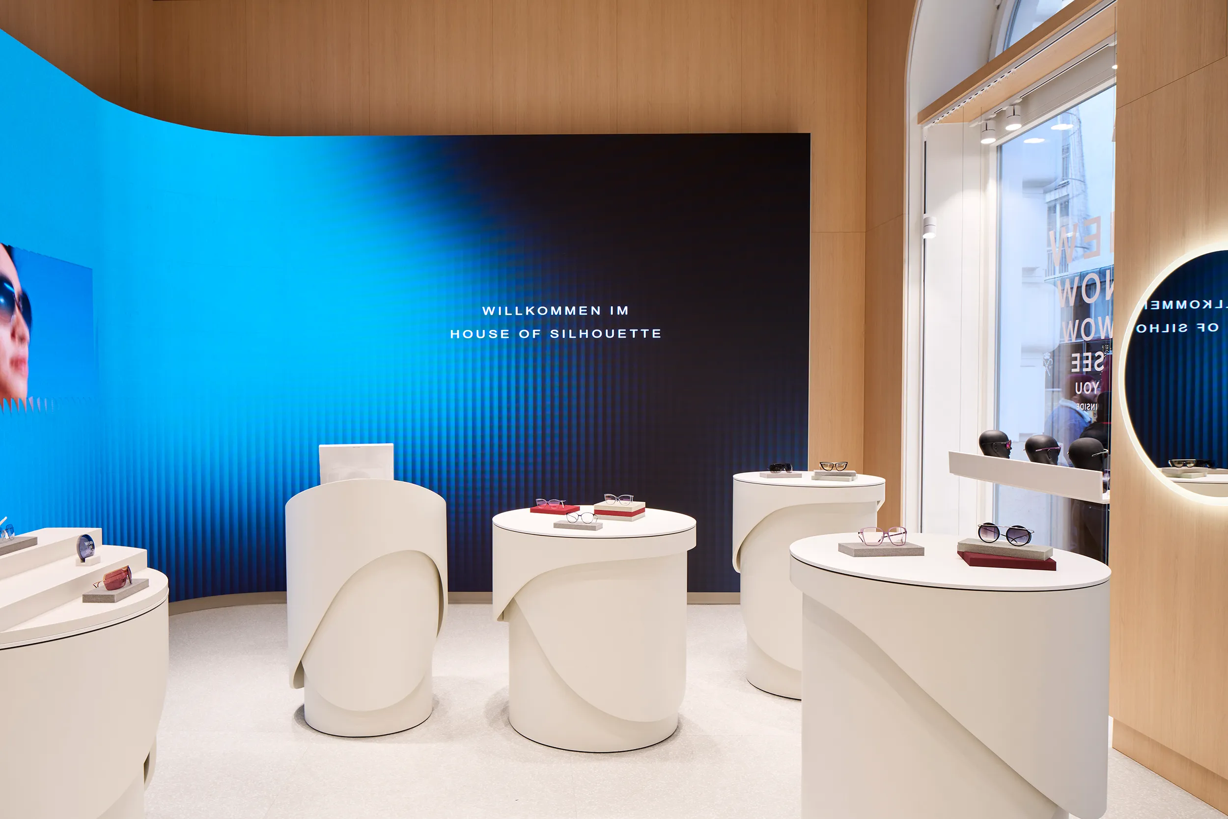Ground floor interaction space at House of Silhouette designed by Ippolito Fleitz Group with HearDis! in-store music curation.