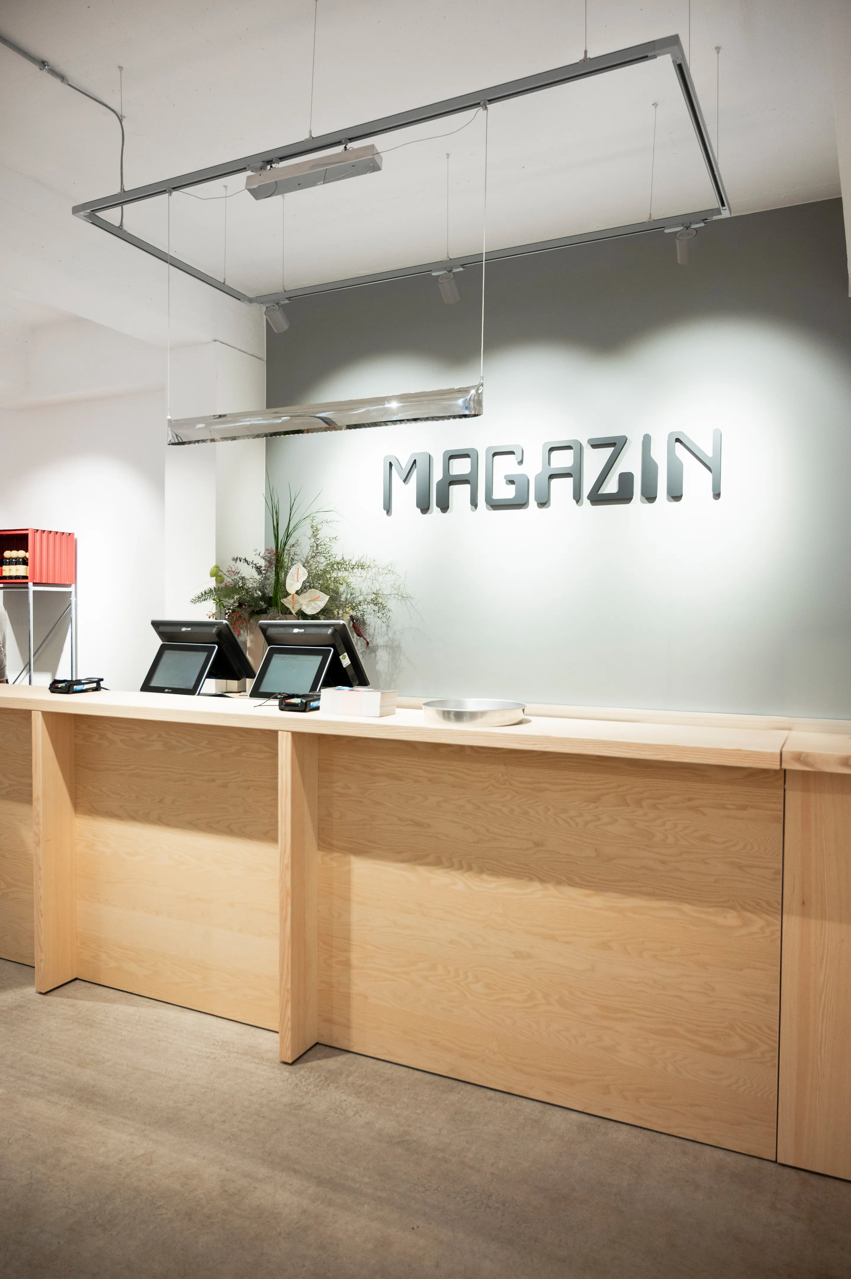 Open display floor at MAGAZIN store in Cologne with integrated in-store music curation.