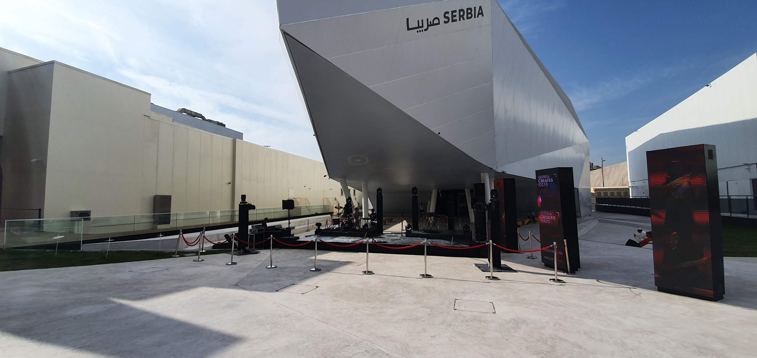  The exterior of the Serbian Pavilion at Expo 2020 in Dubai, showcasing a modern and architecturally striking design.