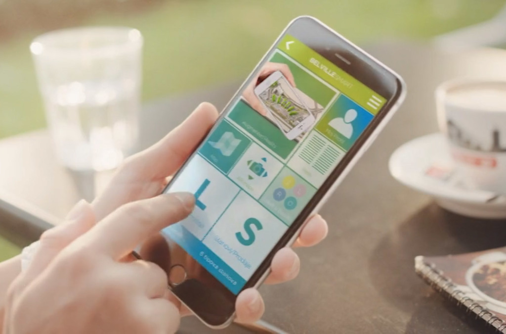 Close-up of a person using the Belville Smart App on a smartphone, browsing through a selection of local amenities with a focus on user interaction.