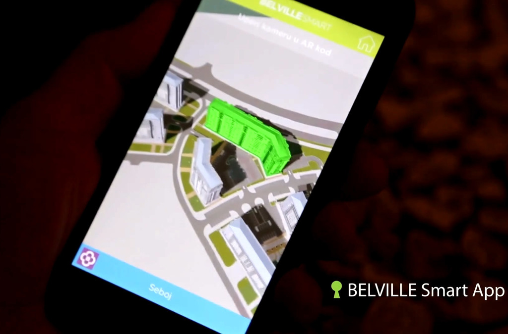 Smartphone displaying the Belville Smart App's interactive 3D map, with a building highlighted in green.