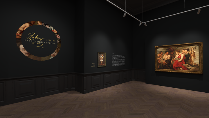 Wide-angle view of an art gallery interior, capturing the serene ambiance created by the combination of dark walls and natural lighting from the skylight above. The gallery displays a collection of paintings with information plaques beside each piece. The herringbone pattern of the wooden floor complements the sophisticated decor, and track lighting overhead adds to the contemplative environment.