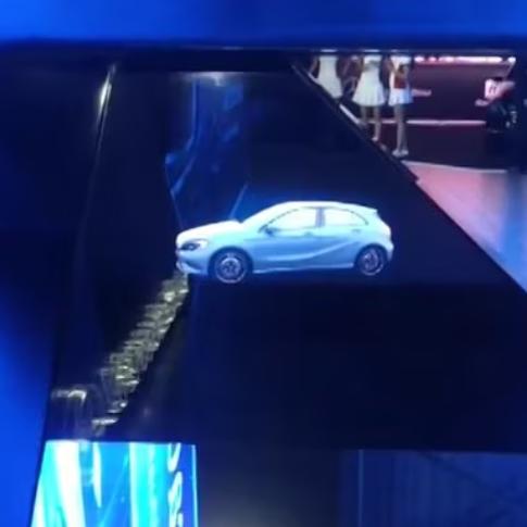 A promotional display for the new Mercedes-Benz A-Class car using a holographic pyramid.