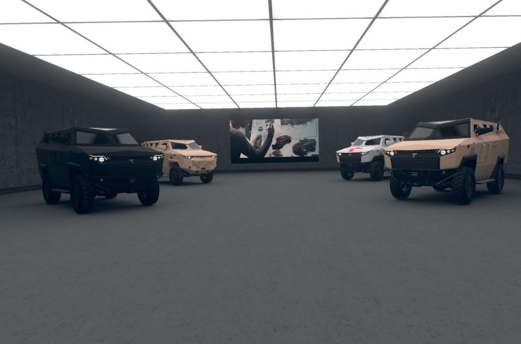 Exhibition room at IDEX 2019 featuring a virtual reality display of four Despot 4x4 vehicles in different colors and configurations, emphasizing their rugged design and versatility for defense purposes.