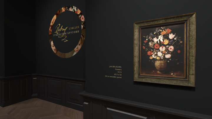 Close-up view inside an art gallery, focusing on a vibrant floral still-life painting in a dark, ornate frame against a dark wall. Next to it, a large, oval-shaped informational display features elegant script on a lighter background.