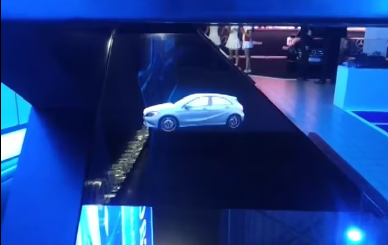 A promotional display for the new Mercedes-Benz A-Class car using a holographic pyramid.