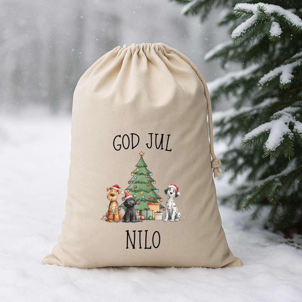 Julsäck med hundar framför julgran