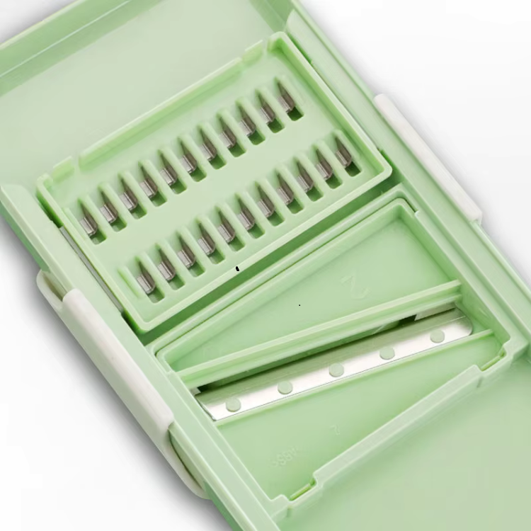 Manuell grönsaksskärare i rostfritt stål – 5-i-1 med handsenskydd och uppsamlingskopp