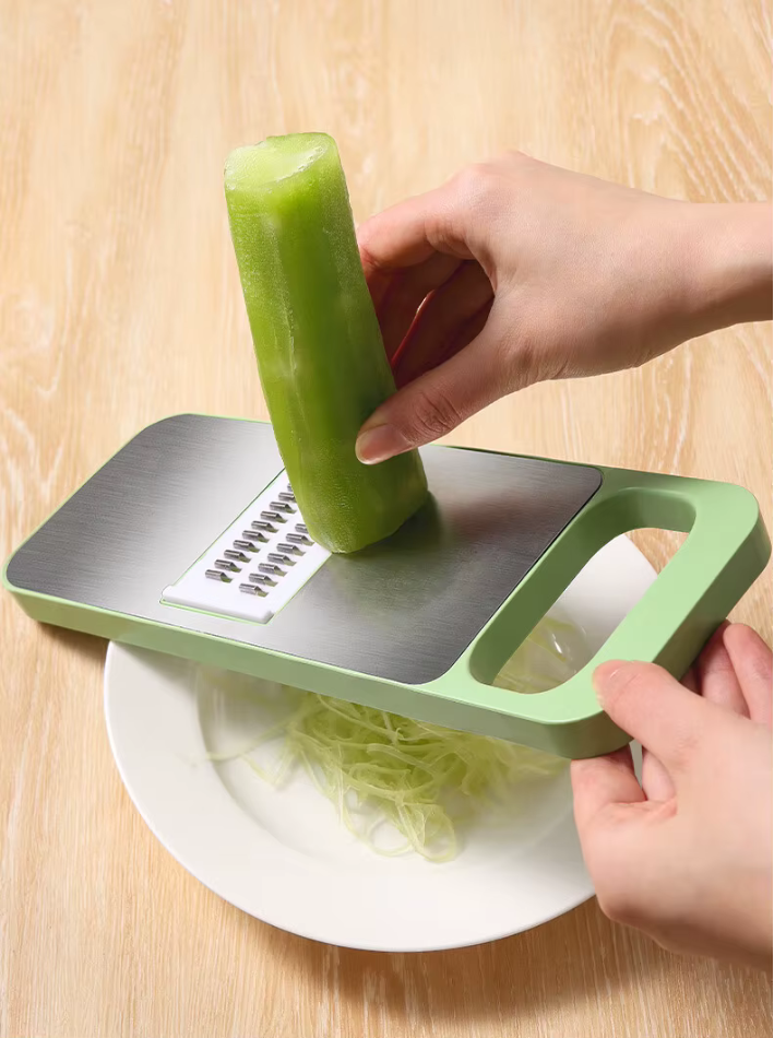 Manuell grönsaksskärare i rostfritt stål – 5-i-1 med handsenskydd och uppsamlingskopp