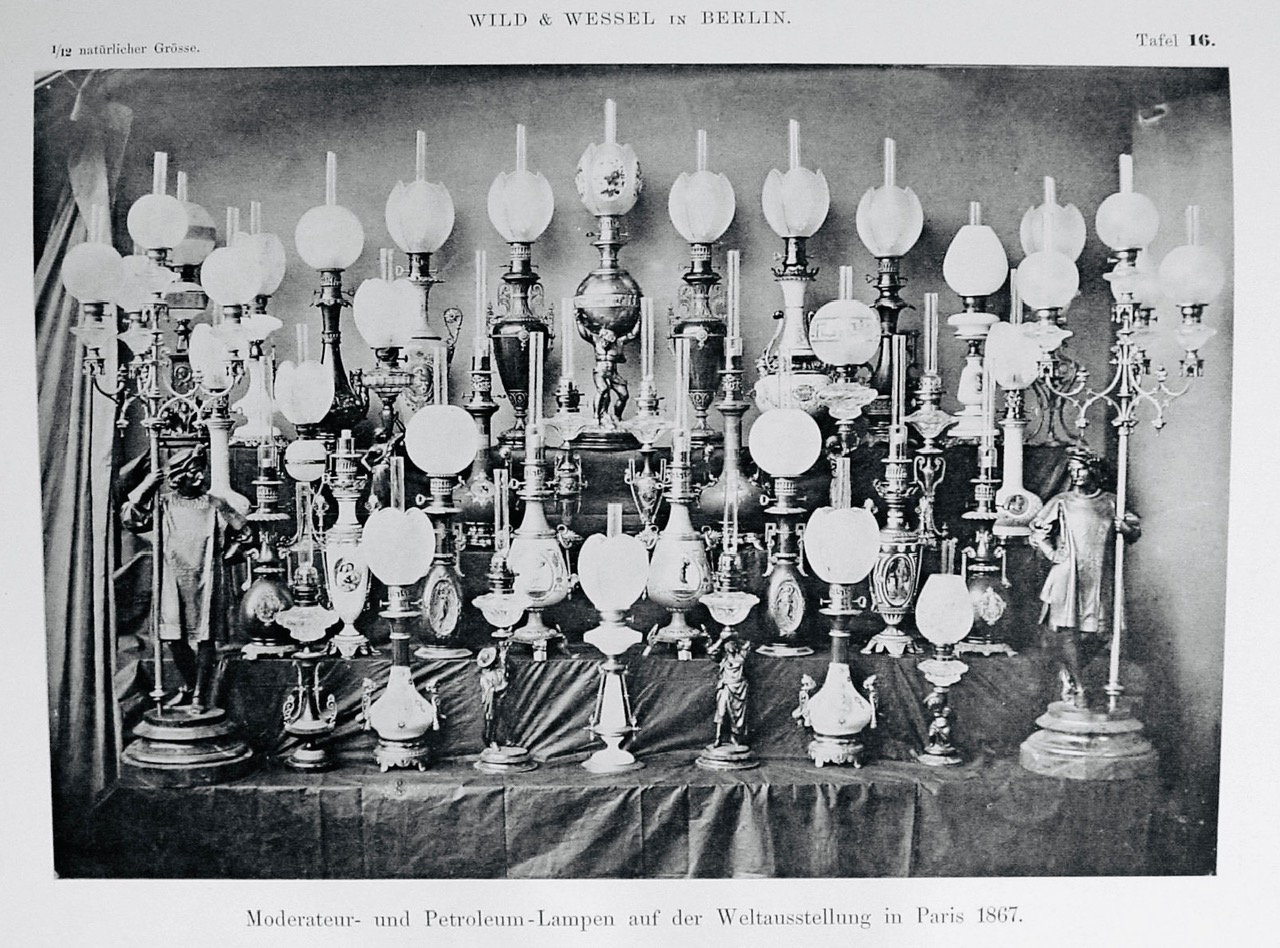 Wild & Wessels lamputställning med moderatörlampor och fotogenlampor i Paris 1867