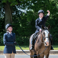 Sophie Burrow, riding Bisto from Bradbourne Group salutes the judge at the end of her test