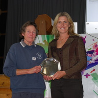 Tina presents Liz Major of Heron's Ghyll with Tora Bray Award