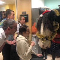 Lizzie (seated) with hospital staff and Moses
