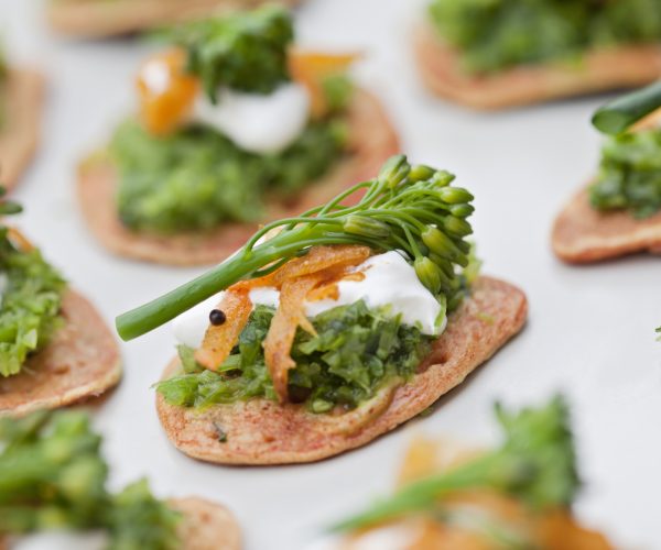 Poodla Blinis with Carrot Sambhal Sour Cream Tenderstem broccoli