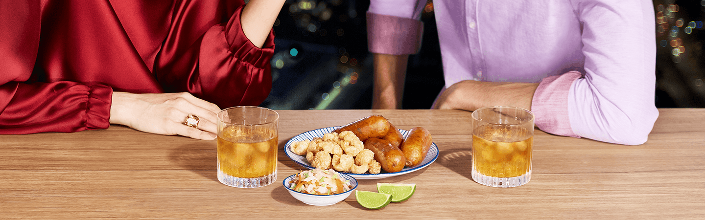 Filipino chicharron and longaniza snacks paired with The Glenlivet whisky