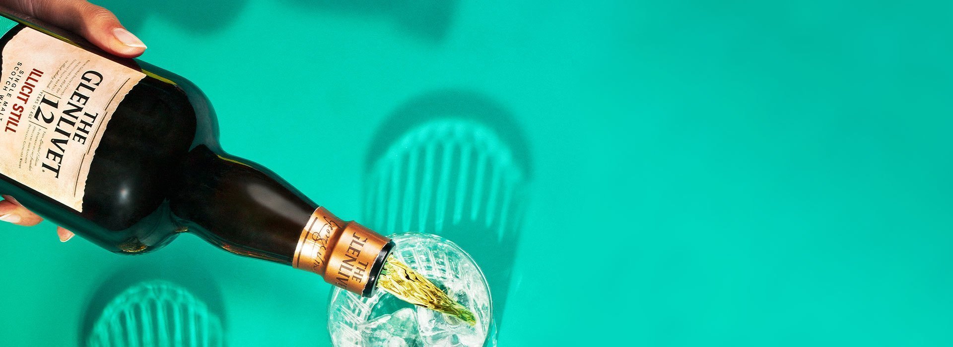 The Glenlivet Illicit Still Pooring on a glass The Glenlivet Illicit Still