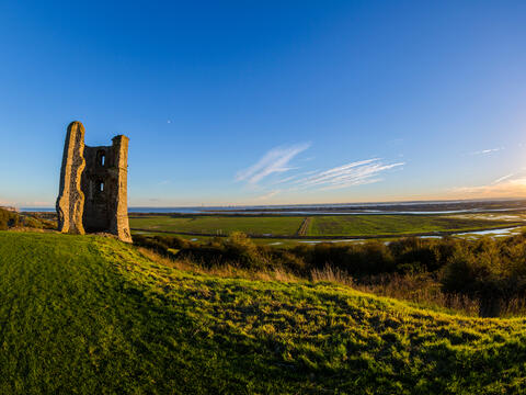 Hadleigh Castle, Essex on the left, with the sunsetting on the right