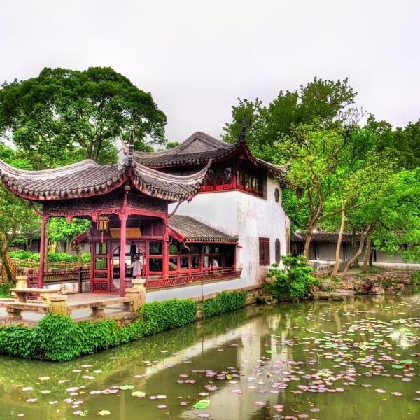 A view over a lily pond to the 12-century Humble Administrator's Garden