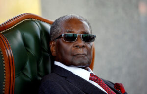 FILE PHOTO: Zimbabwe’s former president Robert Mugabe looks on during a press conference at his private residence nicknamed “Blue Roof” in Harare