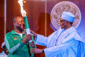 Buhari-lights-‘Torch-of-Unity-to-flag-off-National-sports-festival