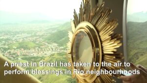 Catholic-priest-blesses-Rio-de-Janeiro-from-the-skies