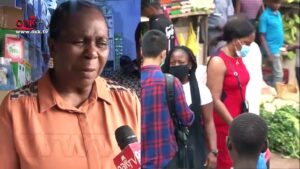 Covid-19-Nigerian-Senator-spotted-in-Wuse-market-buying-sanitizer