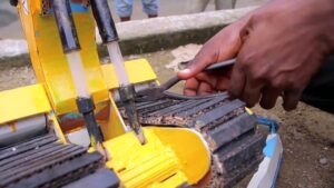 Displaced-Cameroonian-teen-inspires-with-handmade-toys