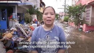 Filipinos-return-to-mud-soaked-homes-after-Typhoon-Goni