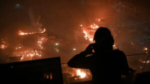 Fire-rages-at-Hong-Kong-campus-entrance-as-protesters-fend-off-police