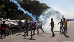 Greek-riot-police-fire-tear-gas-at-Lesbos-migrants