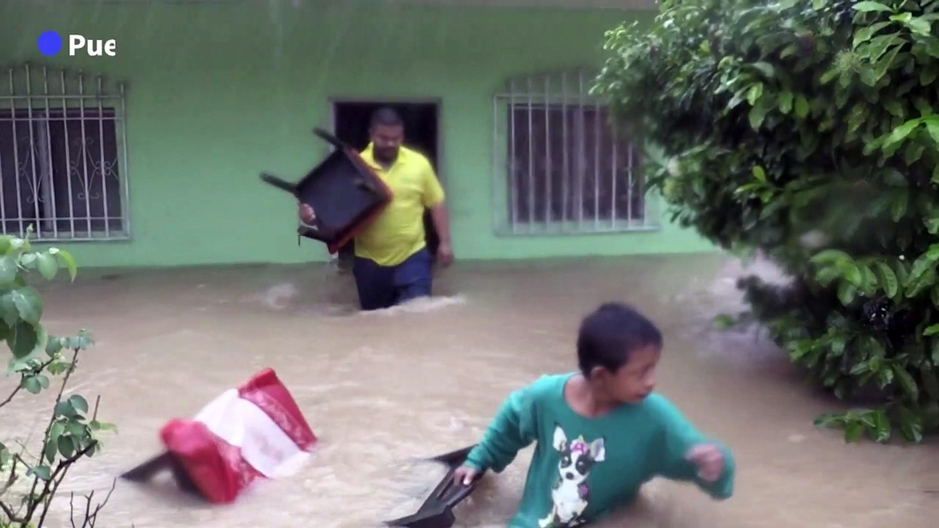 Guatemalans-carry-belongings-pets-through-floods-as-storm-Eta-hits
