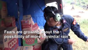 Indonesian-police-deliver-supplies-to-flood-hit-Lebak