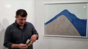 Man-eats-120000-banana-taped-to-wall-at-Miami-art-exhibition