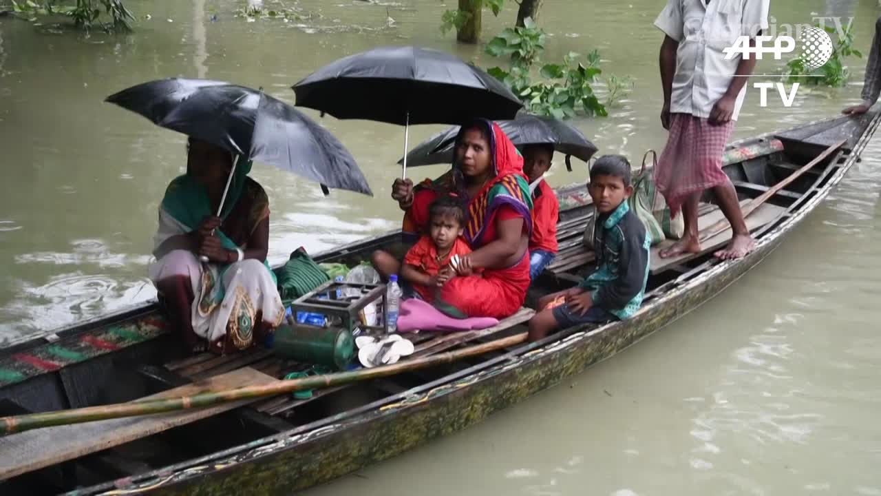 People-flee-floods-from-monsoon-in-Indias-northeast