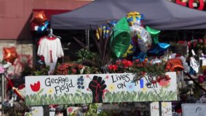 People-gather-at-George-Floyds-memorial-to-celebrate-his-birthday