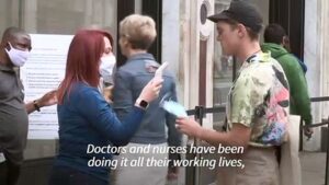 People-in-England-and-Austria-react-as-masks-become-mandatory