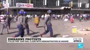 Protests-in-Zimbabwe-turn-violent-as-police-beat-peaceful-protesters-and-fire-tear-gas