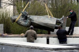 FILE PHOTO: The statue of Soviet World War II commander Ivan Stepanovic Konev is loaded on a truck after removal from its platform  in Prague