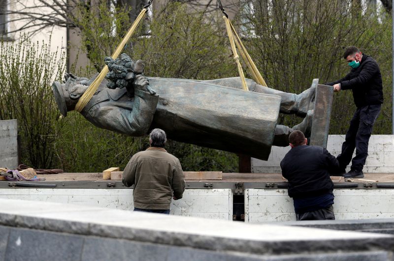 FILE PHOTO: The statue of Soviet World War II commander Ivan Stepanovic Konev is loaded on a truck after removal from its platform  in Prague
