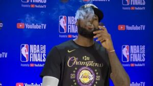 USA-So-much-champagne-a-cigar-for-AD-and-LeBron-after-Lakers-win-NBA-title