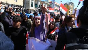 Women-and-men-stick-together-in-Iraq-after-cleric-al-Sadr-criticizes-protesters-immorality