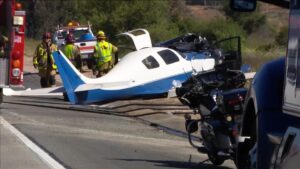 Plane hits car on California highway, at least one dead