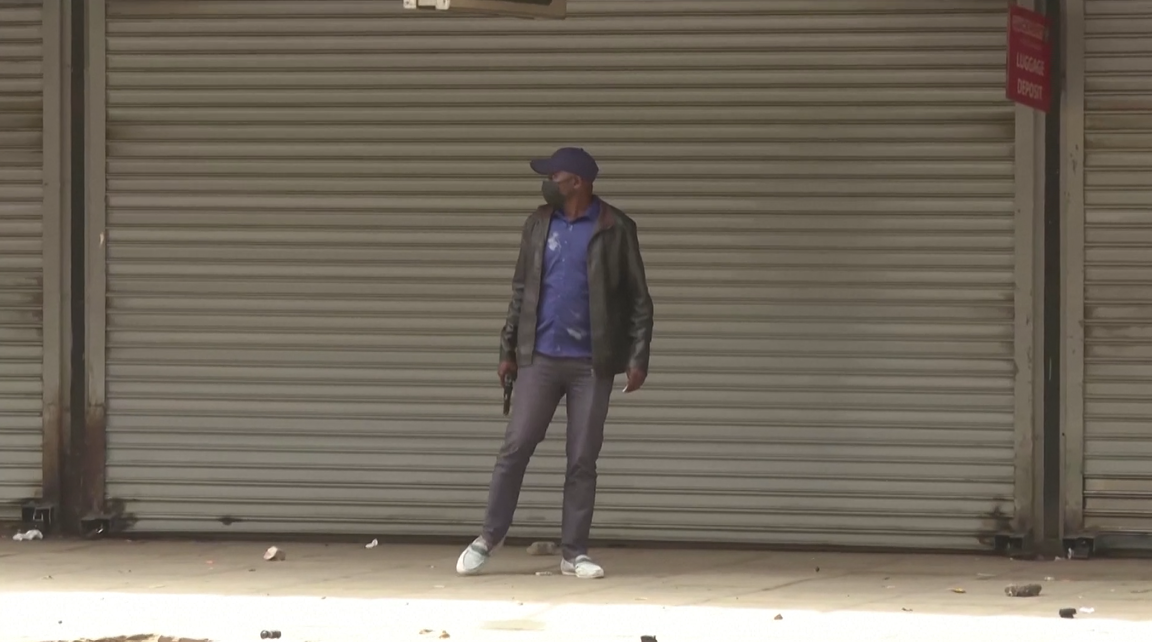 Civilian seen with handguns during Nairobi protests
