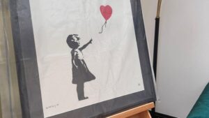 Banksy ‘Girl with Balloon’ art recovered, robbers charged
